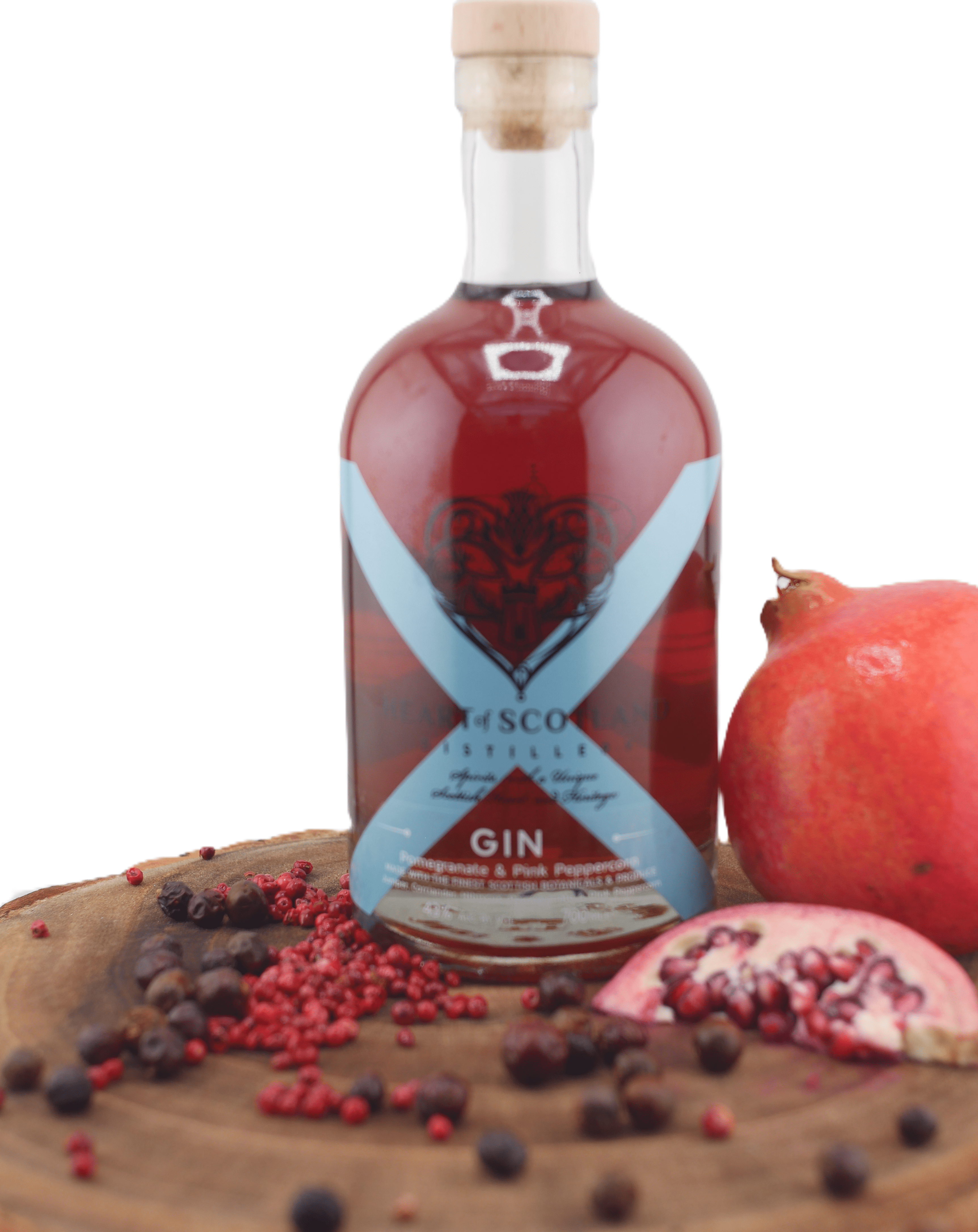 Close-up of a handcrafted Pink Pomegranate Gin bottle, with a rich pink hue, highlighting our craftmanship in this Scottish Craft Premium pink Gin